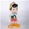 Image 1 : A Ceramic Pinocchio Figurine.