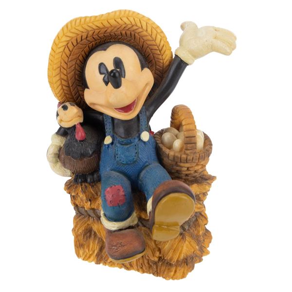 A Farmer Mickey Figurine.