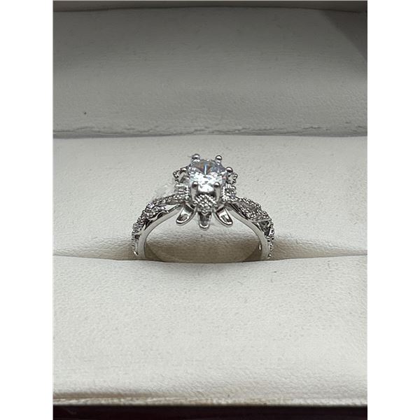 Ladies Engagement Ring with Solitaire and Intricate Detailing