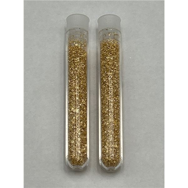 Two Vials Containing Gold flaking material