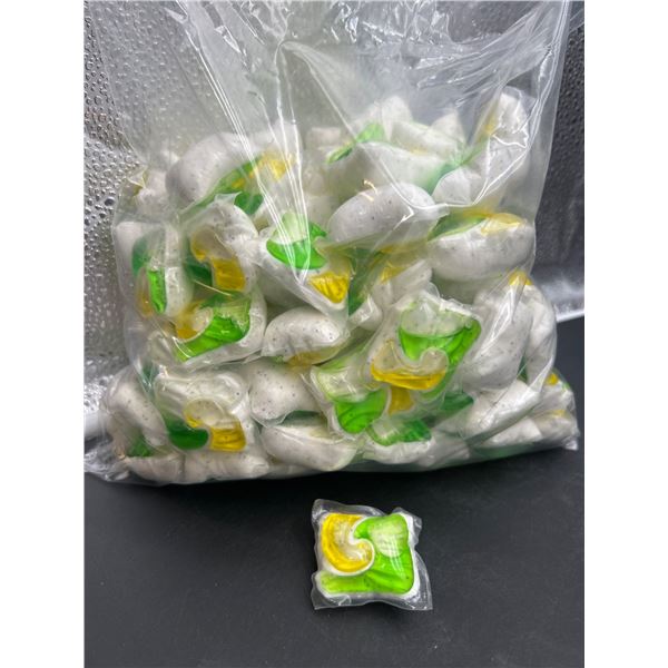 Lot of Detergent Pods with Green and Yellow Gel Components