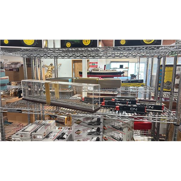 SHELF OF ASSORTED MODEL TRAINS & MODEL RAILWAY IN DISPLAY CASE