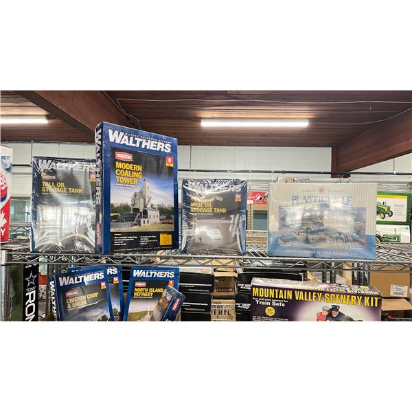 SHELF OF ASSORTED SCALE MODEL TRAIN DECOR KITS