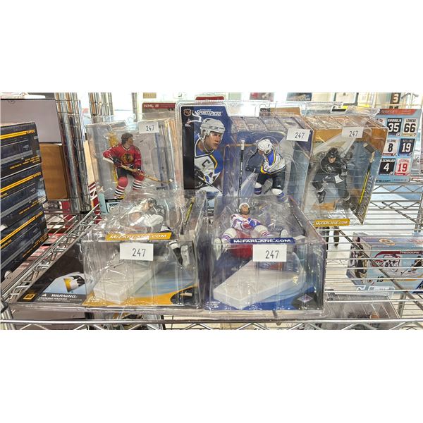 FIVE NHL ACTION FIGURES - BOBBY ORR, CHRIS PRONGER, MARIO LEMIEUX, & ERIC LINDROS