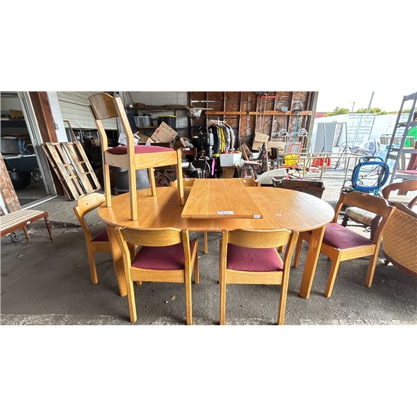 SOLID OAK DINING TABLE WITH 7 MATCHING UPHOLSTERED CHAIRS & 2 LEAFS - APPROX. 78"W X 44"D X 30"H