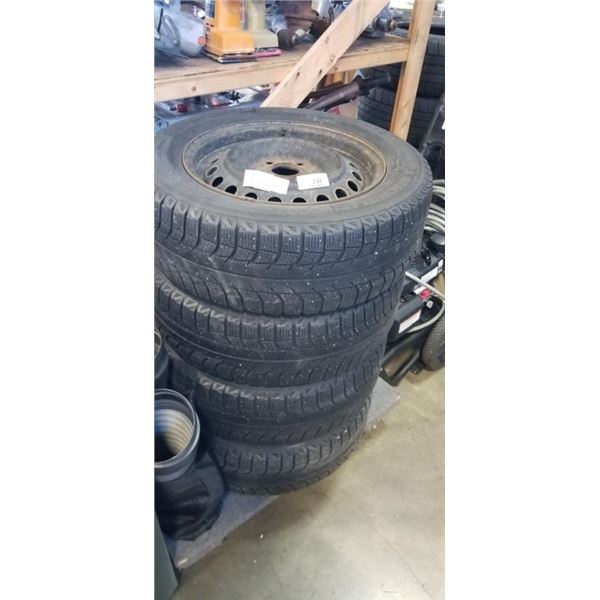 SET OF 4 MICHELIN X-ICE TIRES ON RIMS SIZE 195/65R15