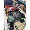 Image 4 : RC BOAT AND 2 MONSTER TRUCKS, ONE IS MISSING REMOTE