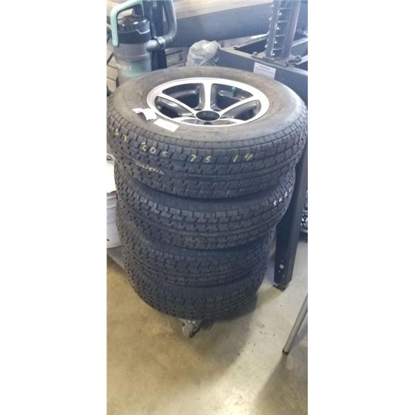 SET OF 4 TIRES ON 5 BOLT ALUMINUM RIMS, ST 205/75R14
