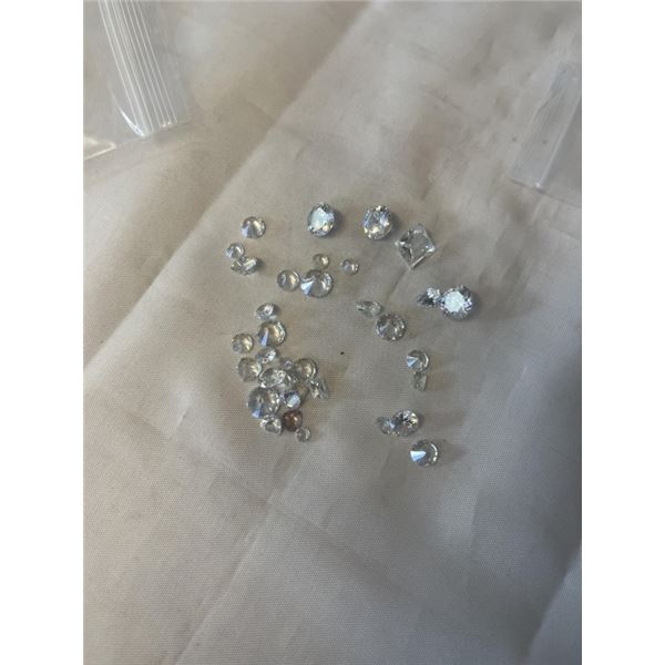 APPROX 85 CT TW, 16.7 GRAMS CZ STONES IN DIFFERENT SHAPES AND SIZES