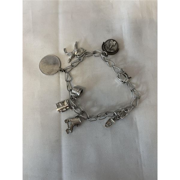 VINTAGE STERLING SILVER CHARM BRACELET MARKED STG