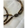 Image 2 : DOUBLE STRAND CARVED TIGERS EYE BEADED NECKLACE W/ ORIGINAL SLVER CLASP