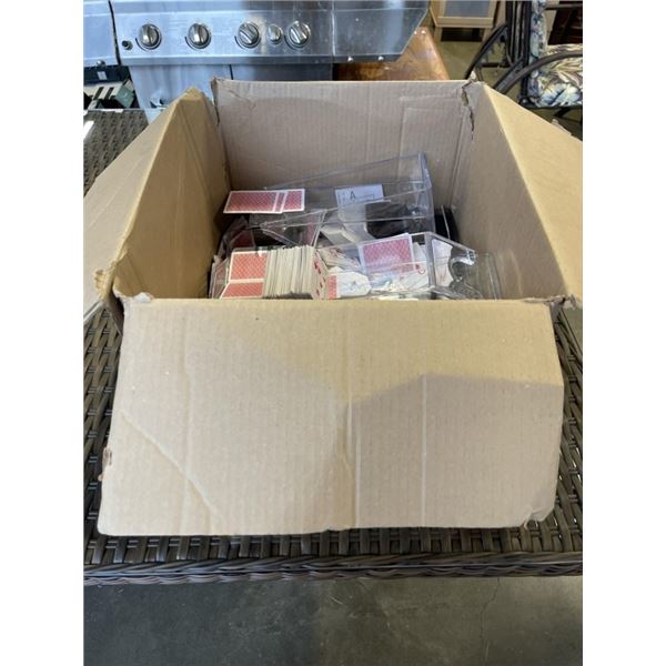 BOX OF PLAYING CARDS AND CARD SHOES