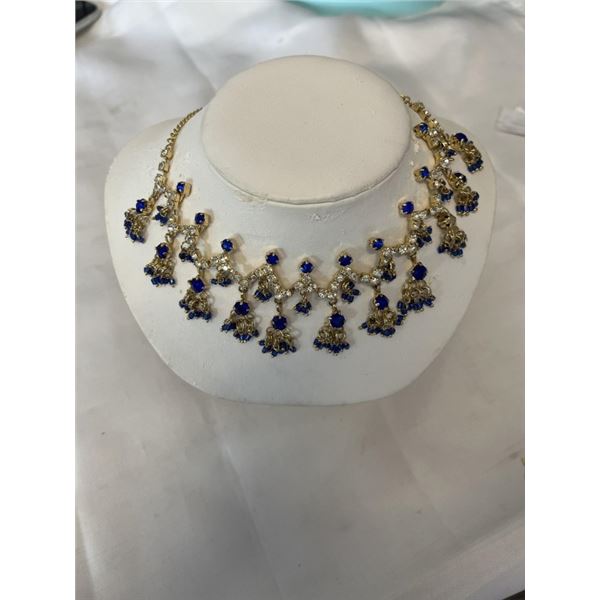 SOUTH EAST ASIAN NECKLACE ON STAND (INCLUDED)