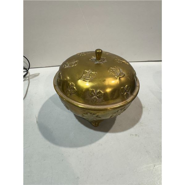 Brass limited container with marbles