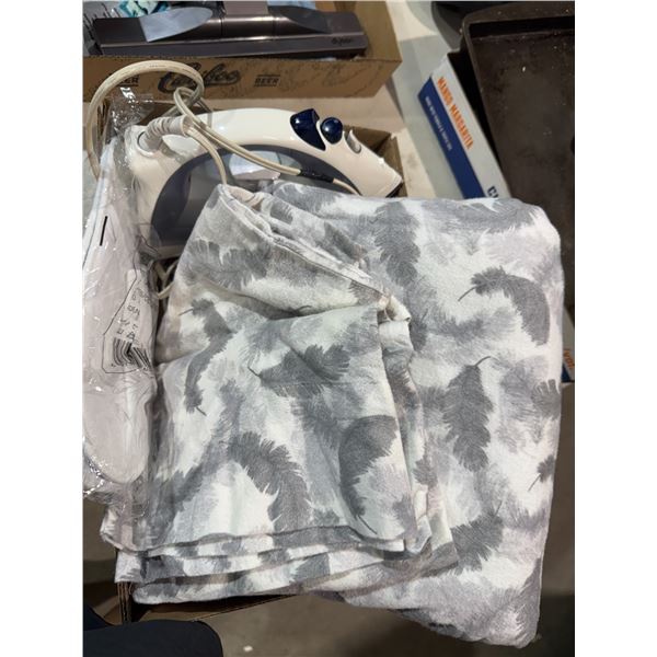 Sheets, pillowcases slippers, and iron