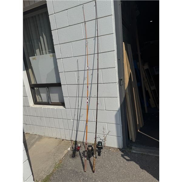 Three fishing rods with reels