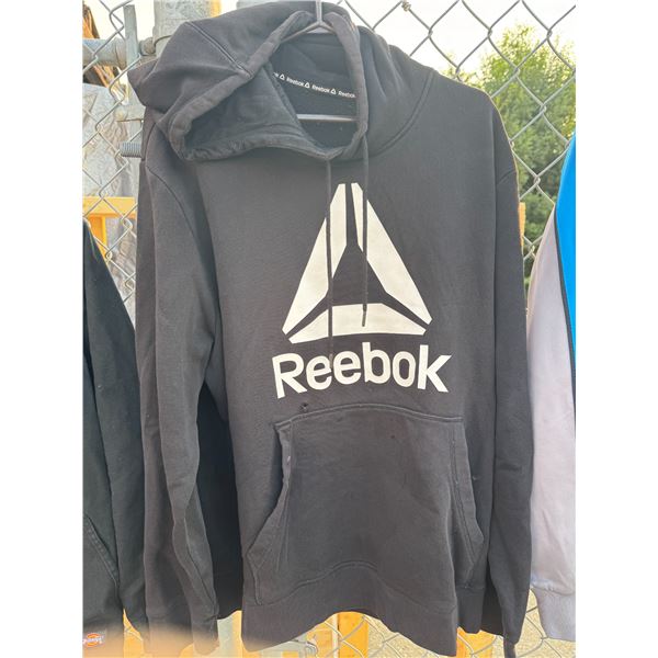 Reebok hoodie has a small hole under the R size not shown