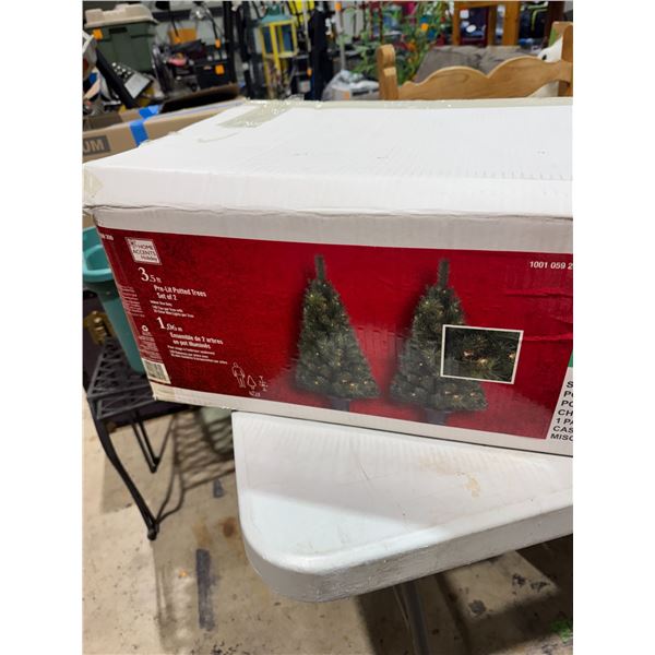 2 Christmas trees, and other decor