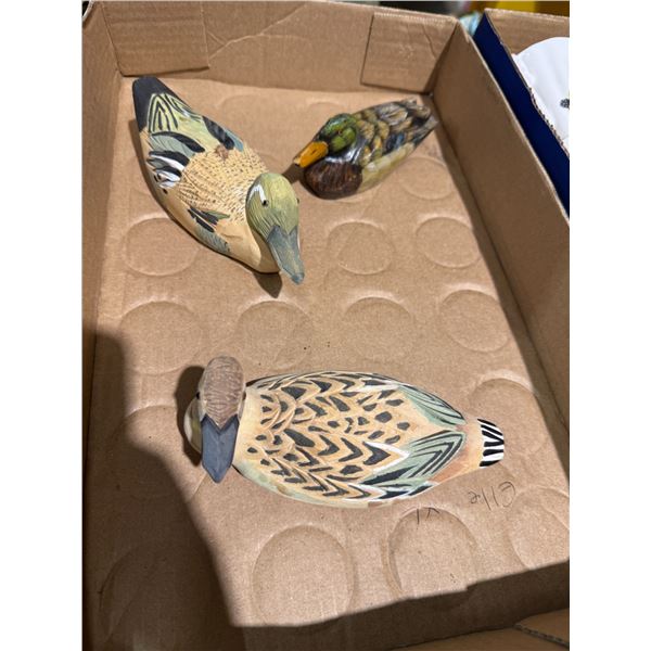 Carved wood ducks
