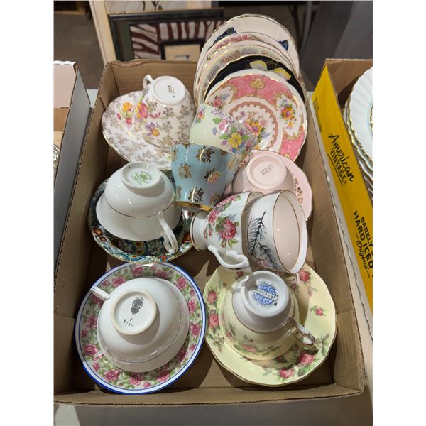 Assorted tea, cups, and saucers