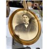 Image 1 : Oval framed wall hanging