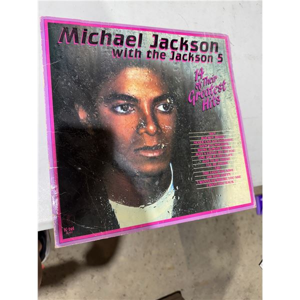 Michael Jackson with the Jackson 5 record