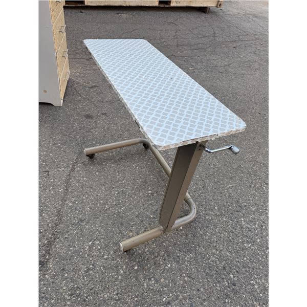 Rolling height adjustable table