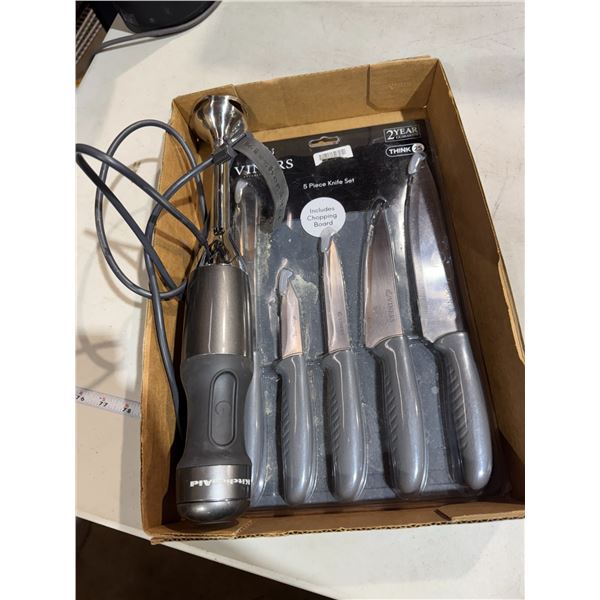 Knives, cutting board and KitchenAid mixer