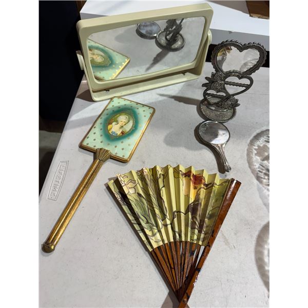 Dresser, top mirrors, earring, stand, and fan