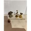 Image 1 : Bells candle, snuffers, and grass
