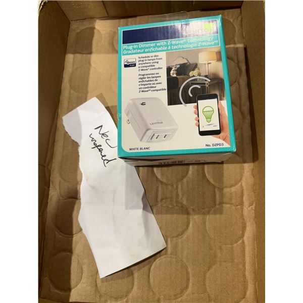 New unopened plug-in dimmer with the Z wave technology