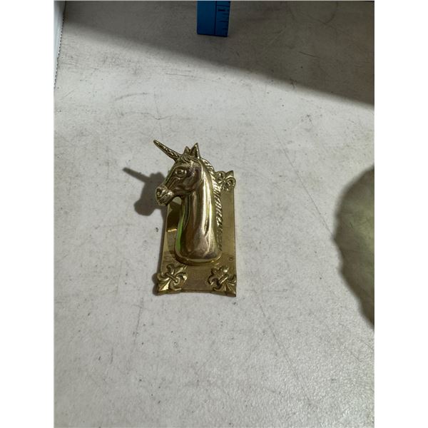 Brass unicorn cliff
