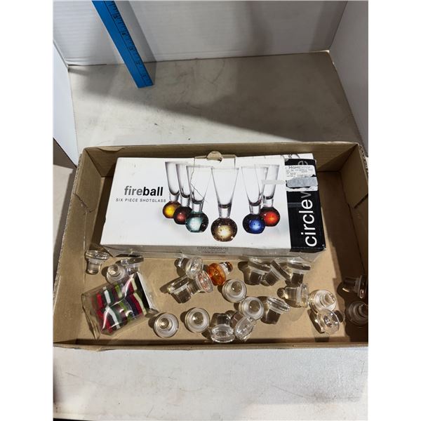 Shooter glasses, stoppers, and star wine markers