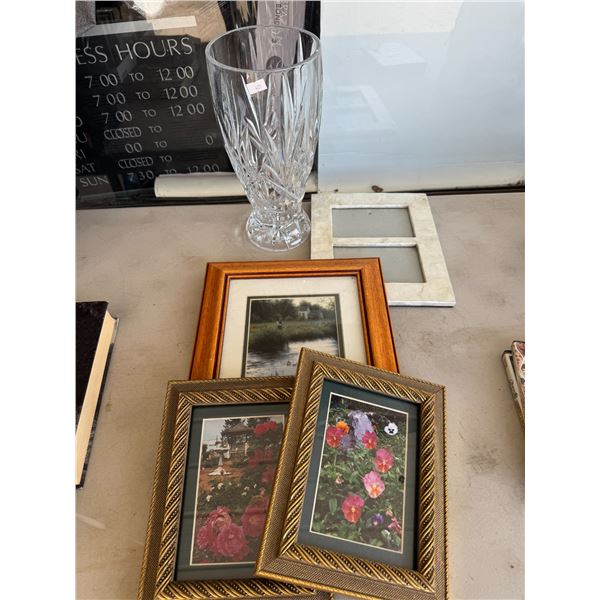 Picture frames in vase