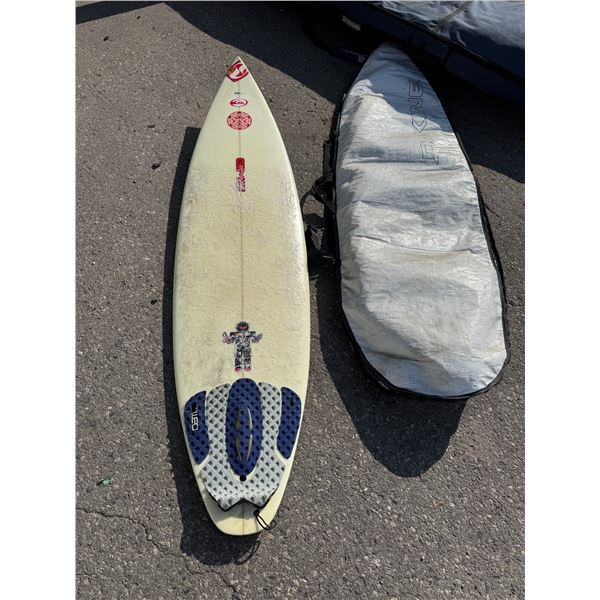 Surfboard with Dakine bag