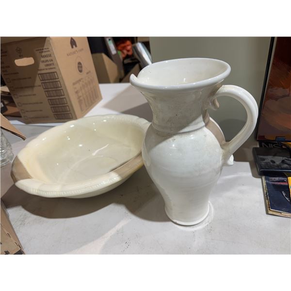 Pitcher and a bowl has a repair