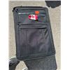 Image 2 : Suitcase, full of hangers