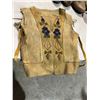 Image 1 : Beaded leather vest one children needs repair