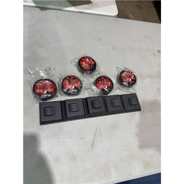 2002 McDonald's team Canada Puck sit with stand