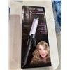 Image 1 : Infinity premier one and a quarter inch curling iron