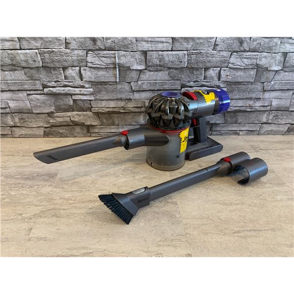 Dyson Rechargeable Vacum With Attatchments - Turns on and Sucks