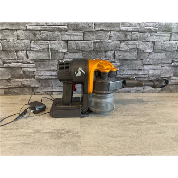 Dyson Rechargeable Vacum With Attatchments - Turns on and Sucks