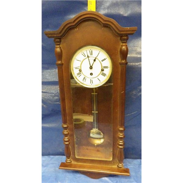 Solar pendulum clock from Eaton's - no key