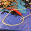 Image 7 : extension cords, battery charger , trouble light etcetera