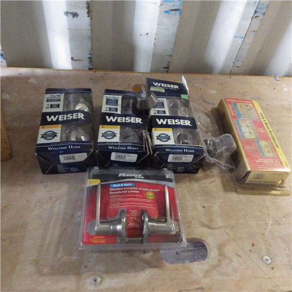 lot of dead bolts and door handles