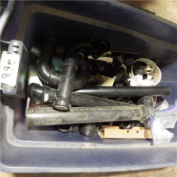 Tub of assorted plumbing supplies