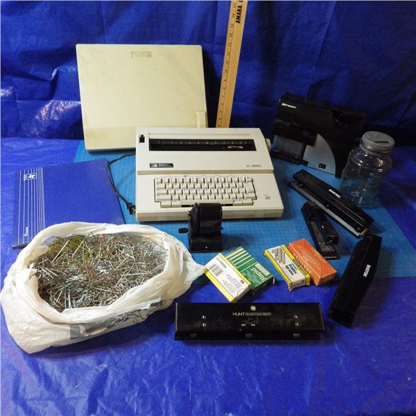 Office items, hole punch, paper clips, Electric typewriter