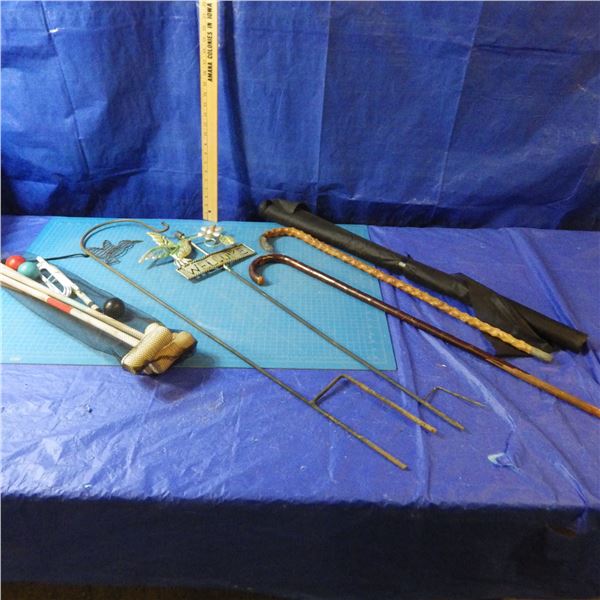 Yard ornaments , croquet set , walking canes