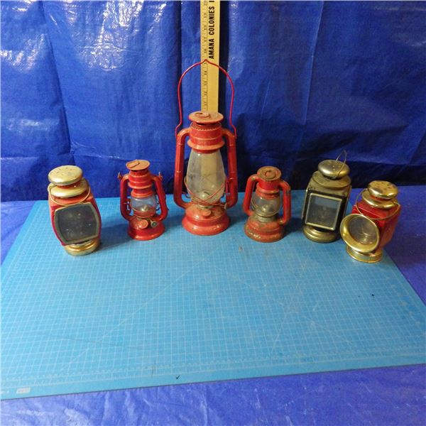lot of miniature coal oil lamps