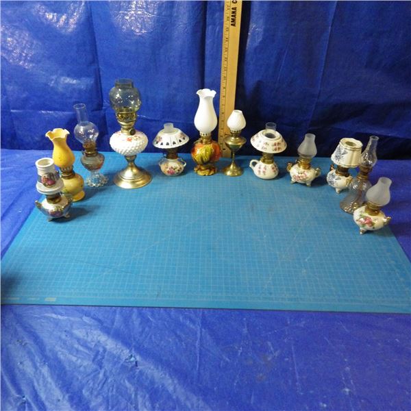 lot of miniature coal oil lamps